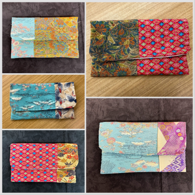 布地の色や柄の異なる和布を組み合わせて作られた、5種類の個性豊かなパッチワーク模様のポーチが並べられた手芸作品集の写真
