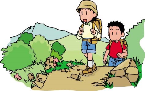 男女二人がリュックを背負って山道をハイキングしている様子