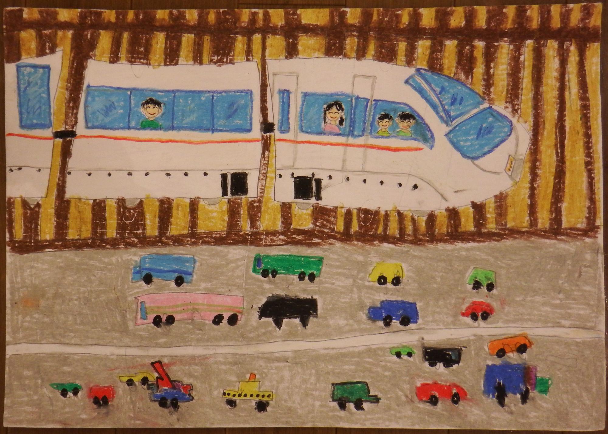 カラフルな色の車やバス、トラックなどの乗り物が道路上を走っている様子を、茶色の線路の上を走る横に赤いラインが入った白い電車の窓から子供たちや女性と男性が笑顔で窓の外を見ている様子が描かれた入選受賞作品の写真